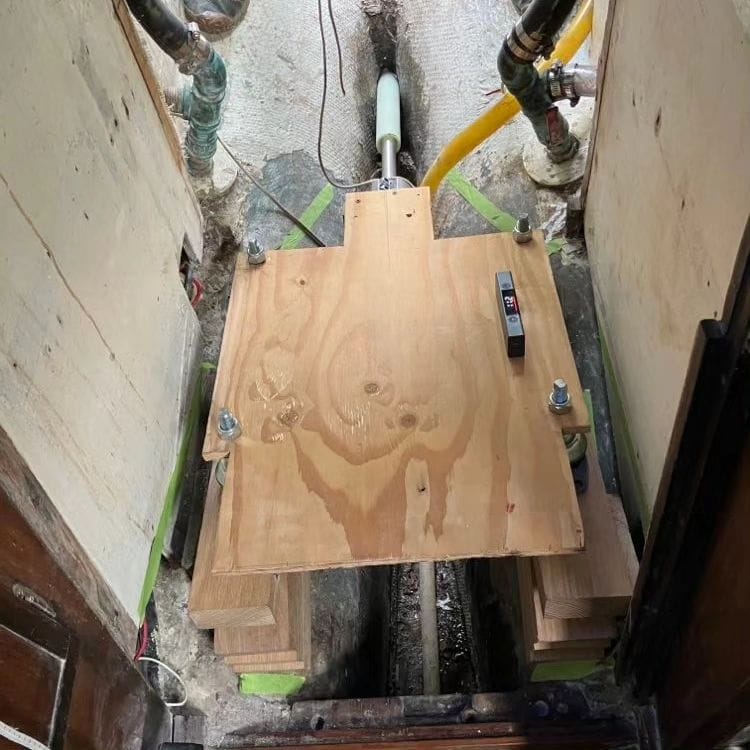 A mock-up engine with a laser protractor.