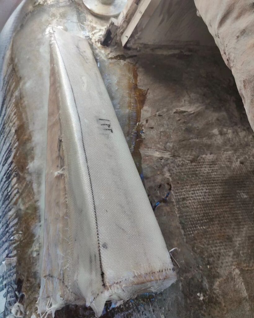 Fiberglassed bearers (port side).